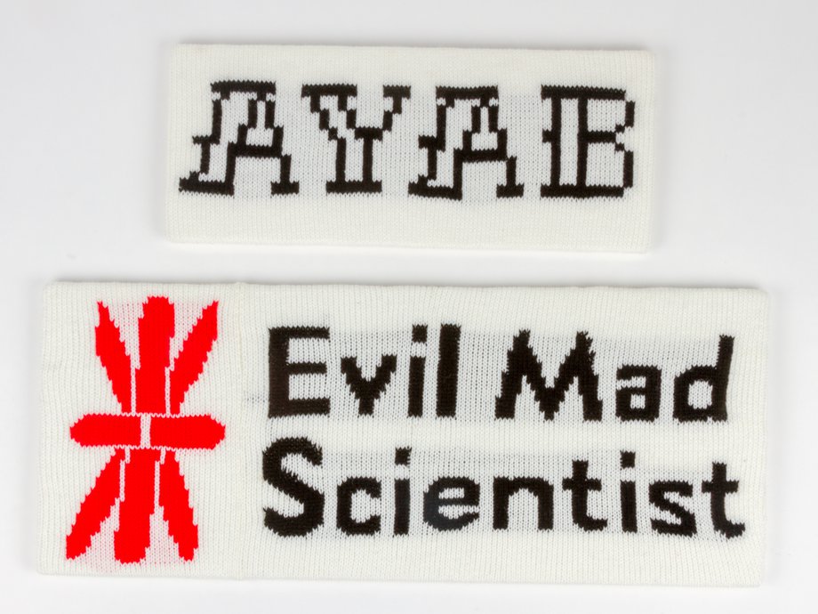 Machine knitted versions of the AYAB and the Evil Mad Scientist logos